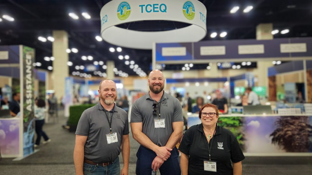 Taylor, Jack, and Jess at the Texas Commission on Environmental Quality conference to present on Tora's environmental compliance consulting expertise.