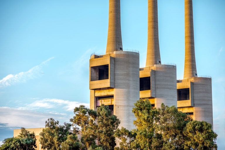 Three concrete industrial towers